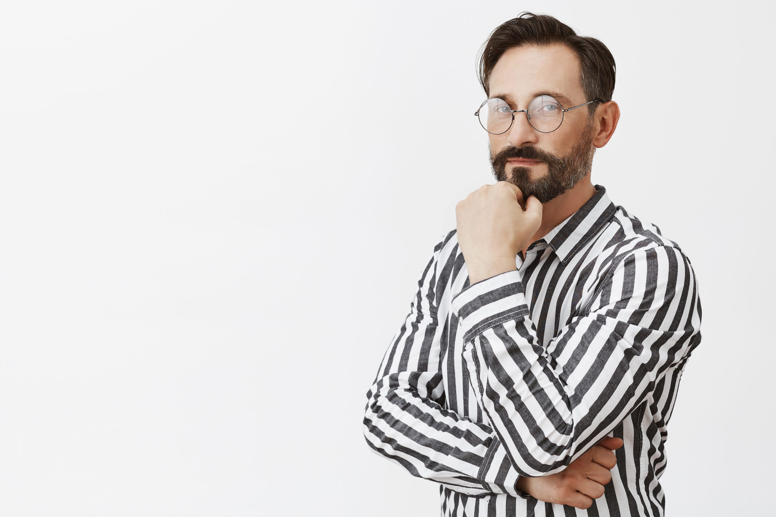 thoughtful bearded mature man posing scaled